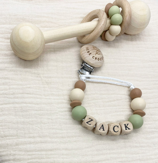 Duo attache-suce/hochet